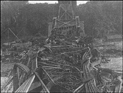 The wreckage of the Quebec Bridge after its collapse on 29 August 1907 — a tangle of twisted steel over the St. Lawrence.